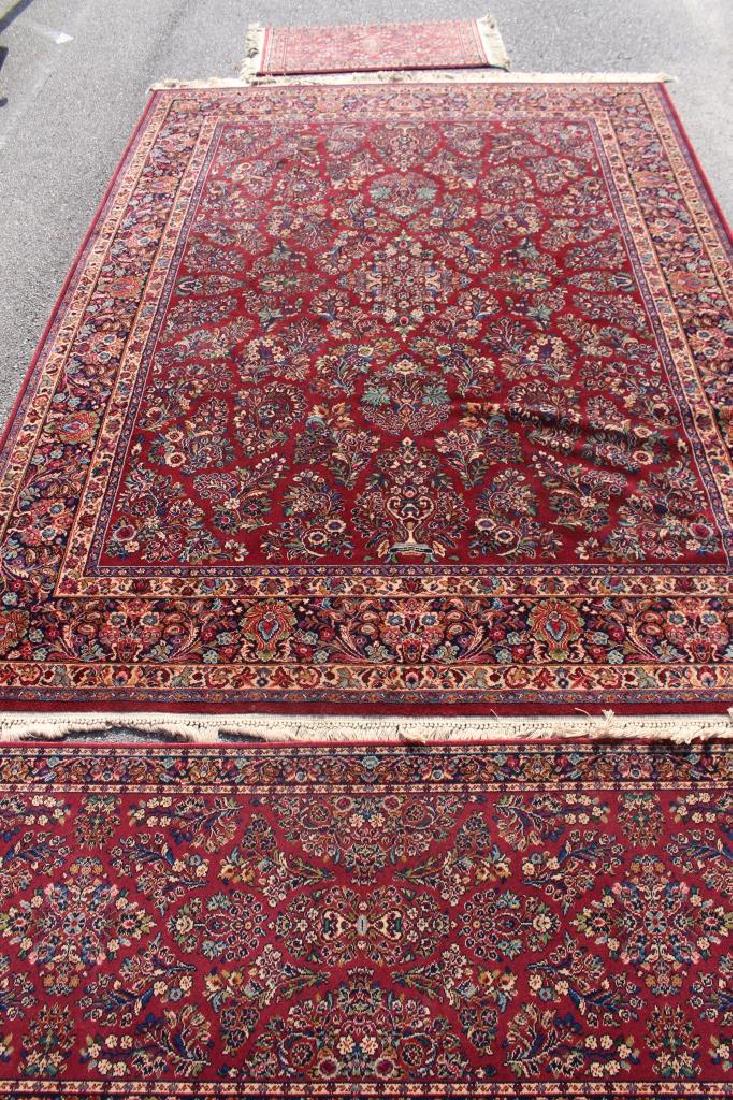 Three Matching Karastan Rugs: Three matching Karastan rug "Red Sarouk" pattern: 8.7' x 12' room size, 2.10' x 9' runner and 4' x 2.3' area rug, all in excellent, like new condition, just cleaned!