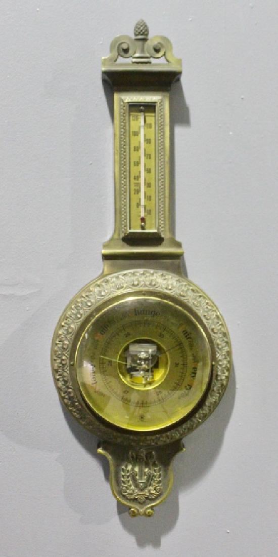 Bronze Cast Barometer: Bronze cast barometer, made in West Germany, imported by West Wood Industries, Paterson, NJ, c. 1960, overall length 31" x 11" diameter, good working condition.