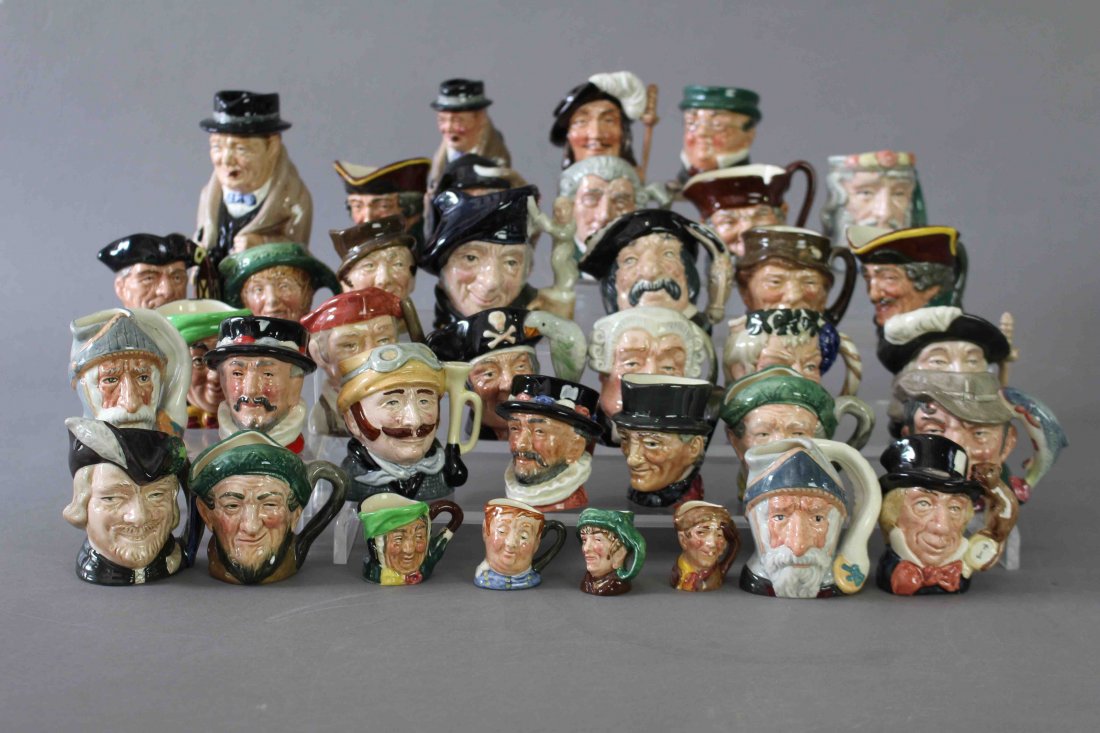 37 Miniature Royal Doulton Mugs: Collection of 37 miniature Royal Doulton Toby mugs: 2 Dick Turpin, Athos, 2 Auld Mac, Gone Away, Old Charley, 2 Don Quixote, Blacksmith, Neptune, Veteran Motorist, Bacchus, Night Watchman, Lawyer, Tom