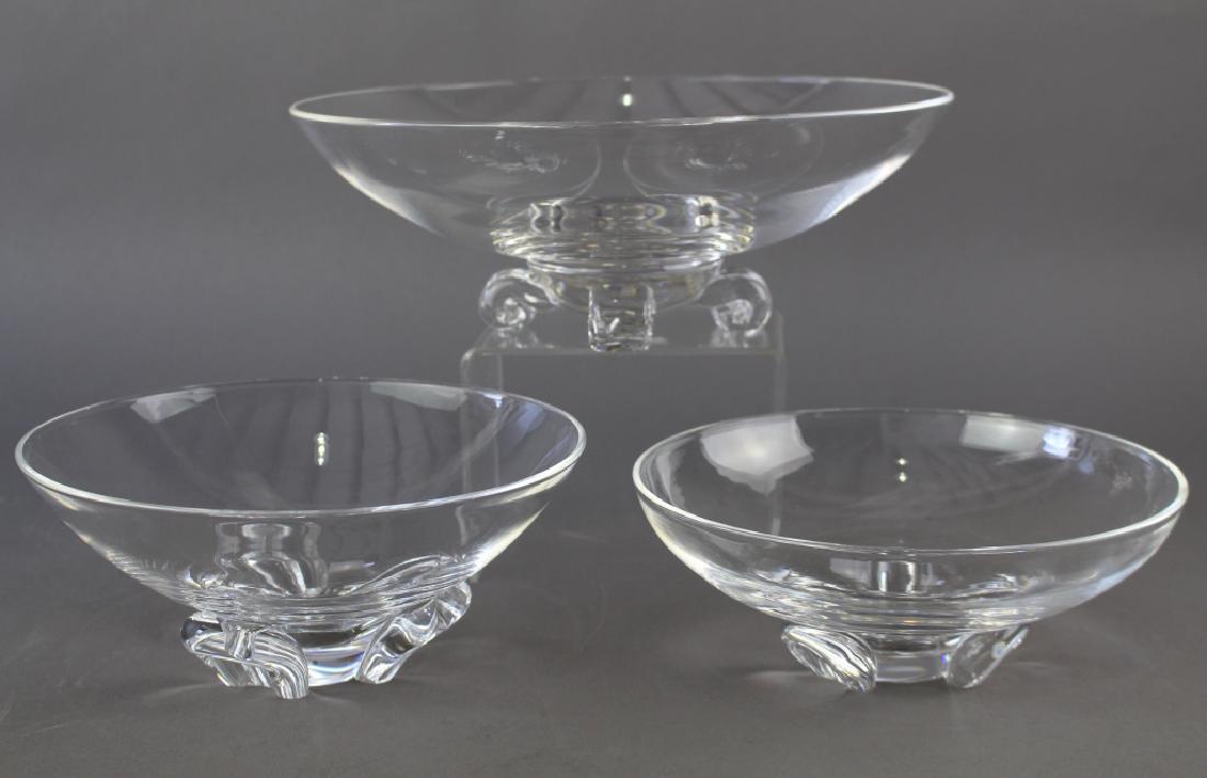Group of Three Steuben Crystal Bowls: Group of three Steuben crystal bowls: Largest 11" diameter x 3.75" scroll footed, designed by John Dreves, the other two 8" x 3.5", 7.75" x 3" bowls designed by Donald Pollard, all mint, all signed. L
