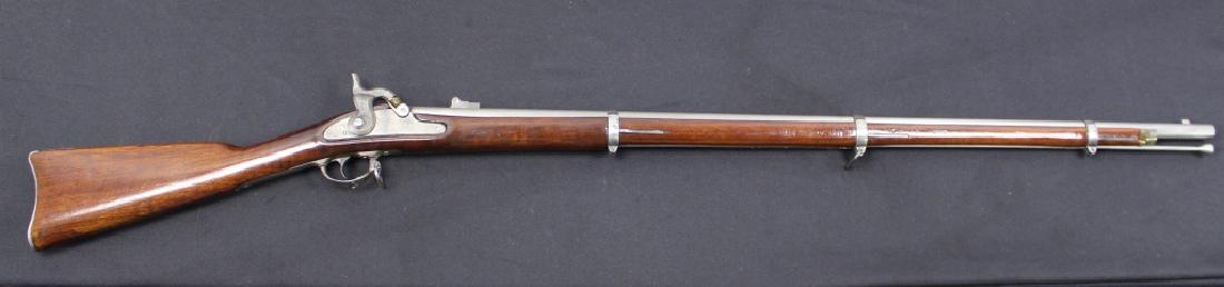 US Bridesburg Percussion Rifle: US Bridesburg percussion rifle, eagle stamp and dated 1868 on hammer plate, cleaned finish, walnut stock, 39" barrel, 56" overall, with bayonet.