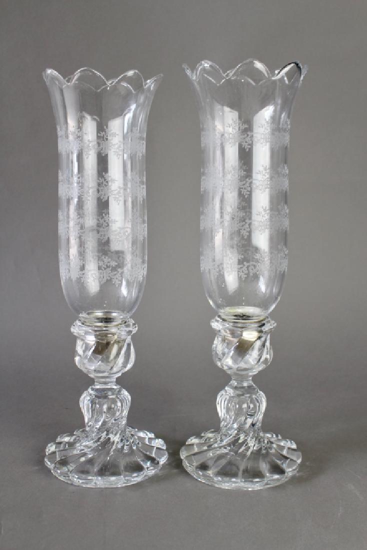 Pair Baccarat Candle Holders & Shades: Pair Baccarat crystal candle holders with tall etched hurricane shades, heavy swirled bases, metal fitters for scalloped top shades, acid etched marks on both, 16", mint condition.