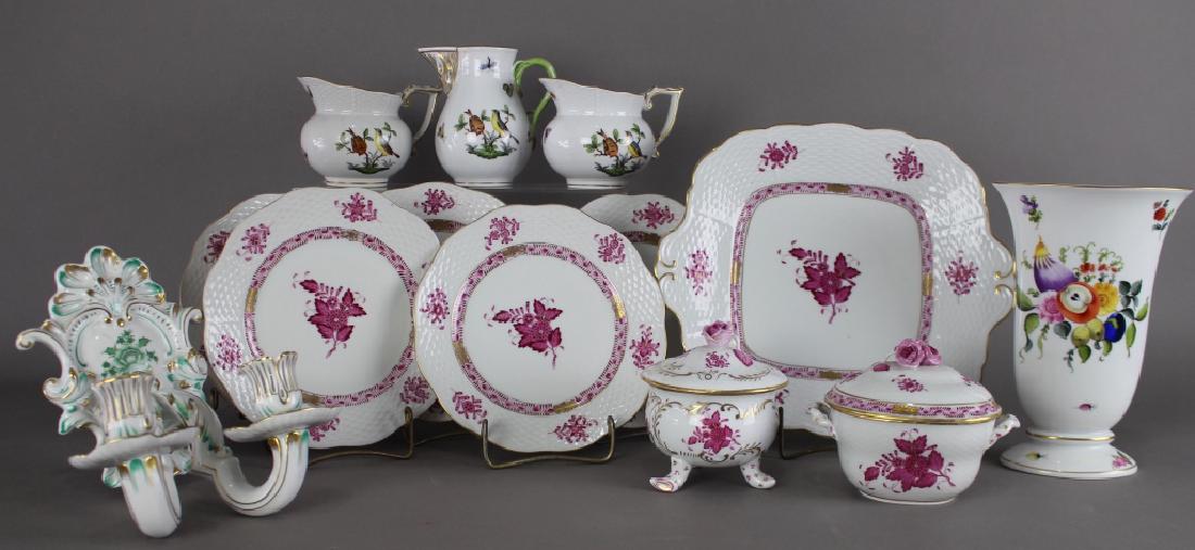 Thirteen Pieces Herend Porcelain: A collection of 13 pieces of Herend hand painted porcelain: 10.5" Raspberry cake plate, 5-7.5" Raspberry salad plates, both with 1942 mark, 8" x 5" x 6" double candle holder wall sconce, 8" Fruits & F