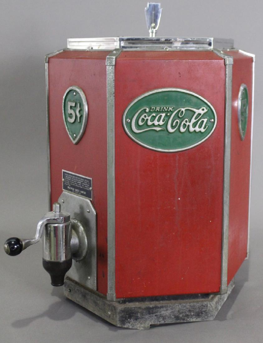 Rare Six-Sided Coca-Cola Dispenser, c. 1930s: Rare six-sided Coca-Cola dispenser, c. 1930s, with affixed metal plaques to each side including "5 cent", all original with lid, chrome Deco finial, minor wear and scratches consistent with age, fauce