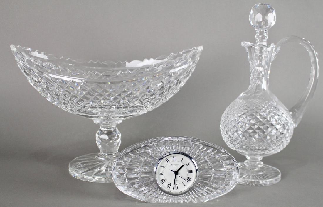 Three Pieces of Waterford: Three pieces of Waterford: Signed clock, prism cut claret jug, 12.5", large pedestal center or fruit bowl 9" x 13.5". All signed and in mint condition.