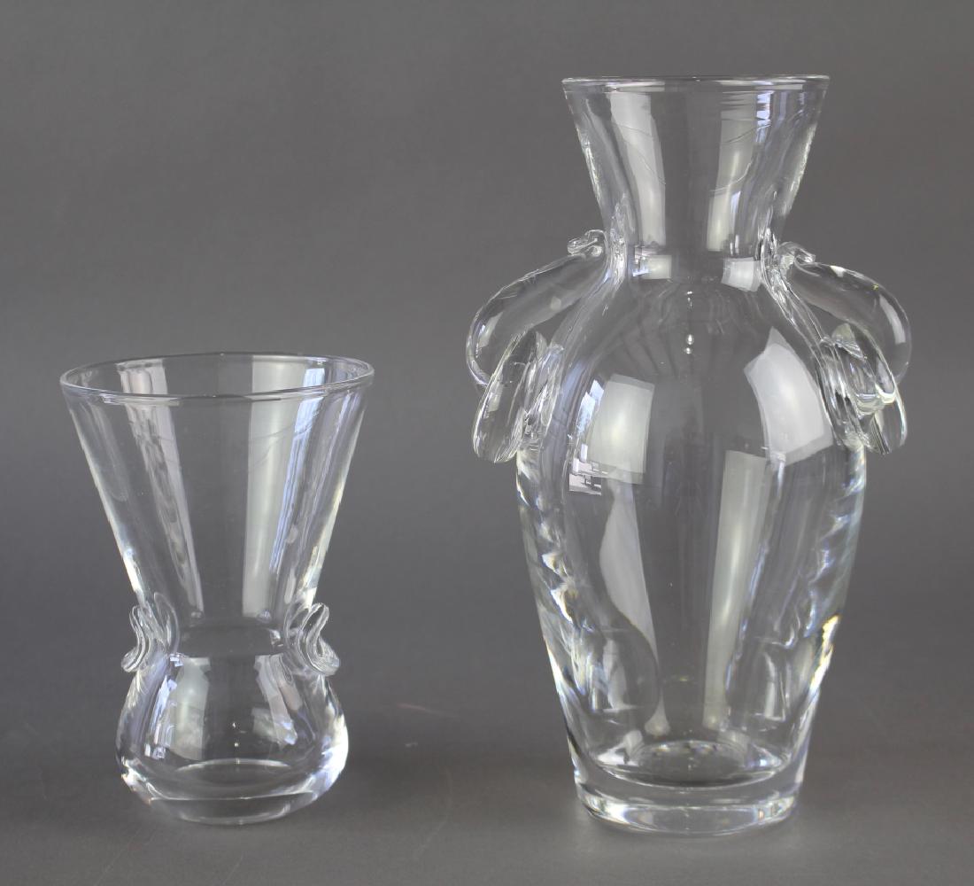 Two Steuben Crystal Vases: Two Steuben crystal vases: Crystal 9.75" heavy vase with attached ring handles and a 6" vase for small bouquets, both mint and signed.