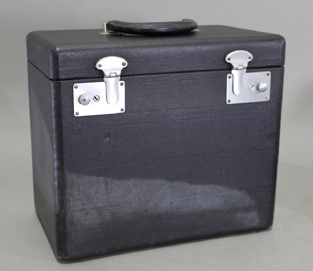 Singer Featherweight Sewing Machine: Singer Featherweight sewing machine, Centinneal Edition, all bobbins, button hole attachment, with rare fitted canvas cover, excellent condition.