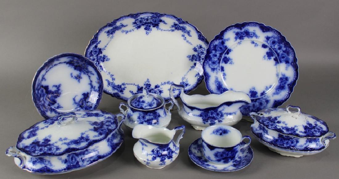 Group of Alfred Meakin Flow Blue: Group of Alfred Meakin Flow Blue porcelain in the "Devon" pattern. 10-9.75' dinner plates (one with rim nick), 2-8.75" luncheon plates, 4-7.75" salad plates, 7-7" dessert plates, 2-6" bread & butter p