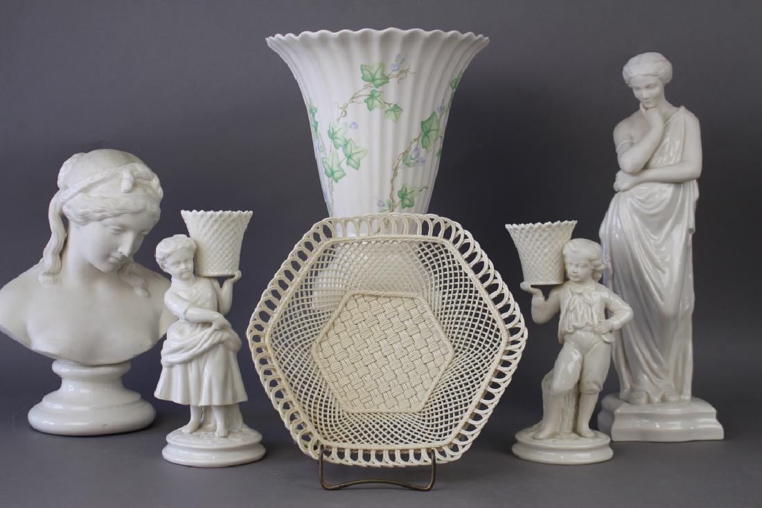 Irish Belleek Porcelain Group: Group of six Irish Belleek porcelains: 11" bust of girl with gold mark, 2 green mark figural boy and girl, large green mark vase 10.5" x 8.5", 15" figurine of "Meditation" with gold mark, 8.5" open we