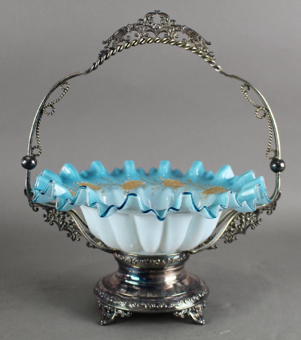 Victorian Bride's Basket, c.1890: Victorian Bride's basket, c. 1890, blue ruffled bowl with gold leaves encircling interior, Rogers triple plated frame, 12" diameter, 14" h, very good condition.