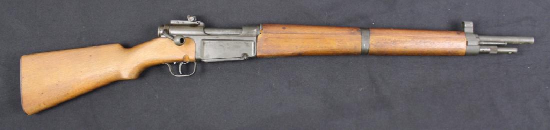 French MAS Military Rifle: French MAS .308 caliber military rifle with enclosed piercing bayonet, model 1936, serial #84074, 22" barrel, 40" overall, good clean condition. NOTE: No internet bidding on this item, unless you have