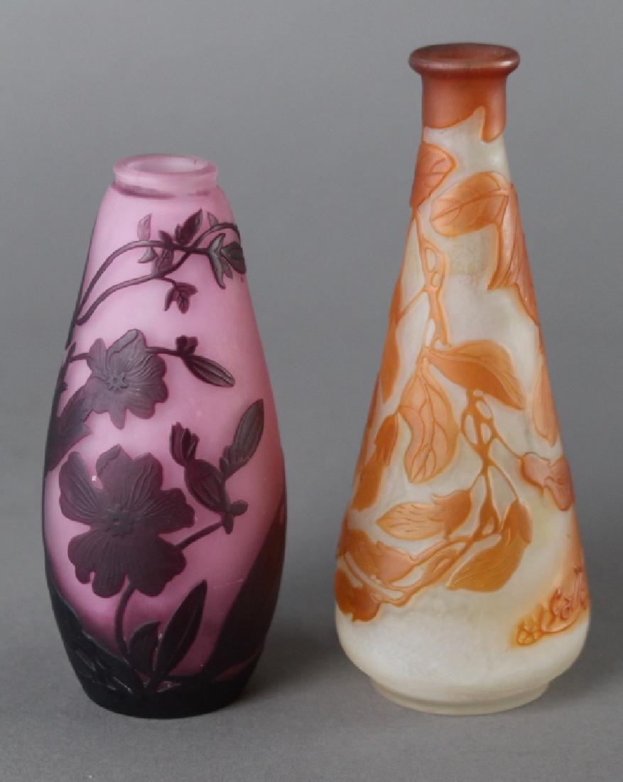 Two Galle Cameo Glass Vases: each signed, one is 5.25" with 2 colors, the other is 4.5" and deep lavender and purple colors, both good condition.