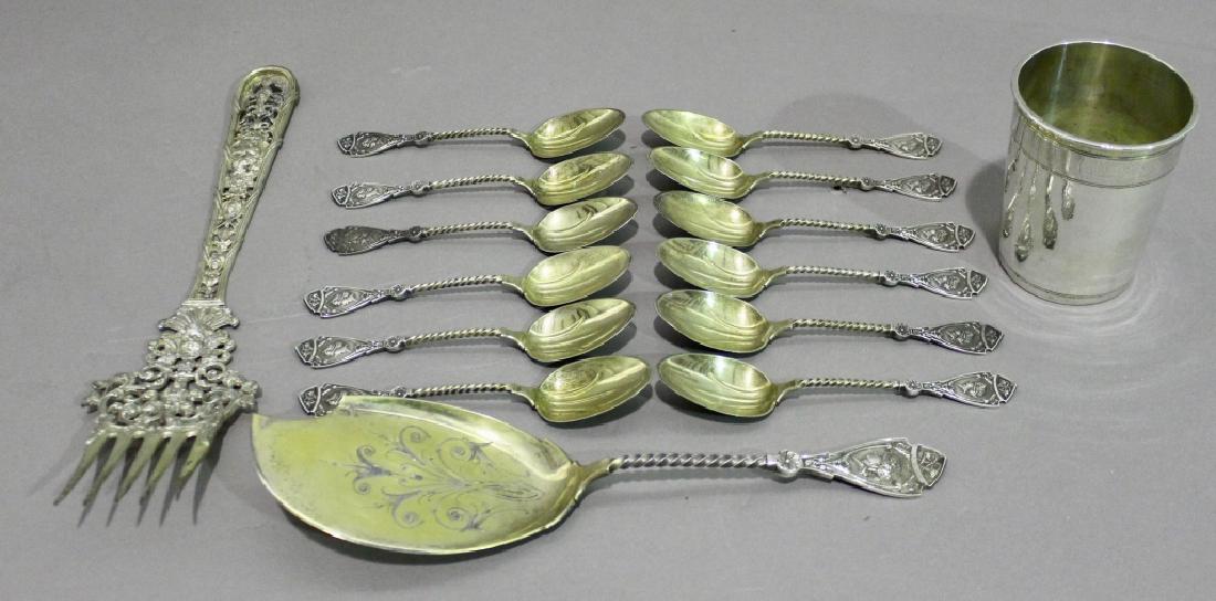 Group of Sterling with Coin Silver Beaker 1700: to include Johannes J. Neurdenburg, Amsterdam, 11.5" hand made serving fork, 83.3% silver, 12-5.75" dessert spoons by Walker & Hall, Sheffield, a Walker & Hall etched 10" etched bowl dessert server an