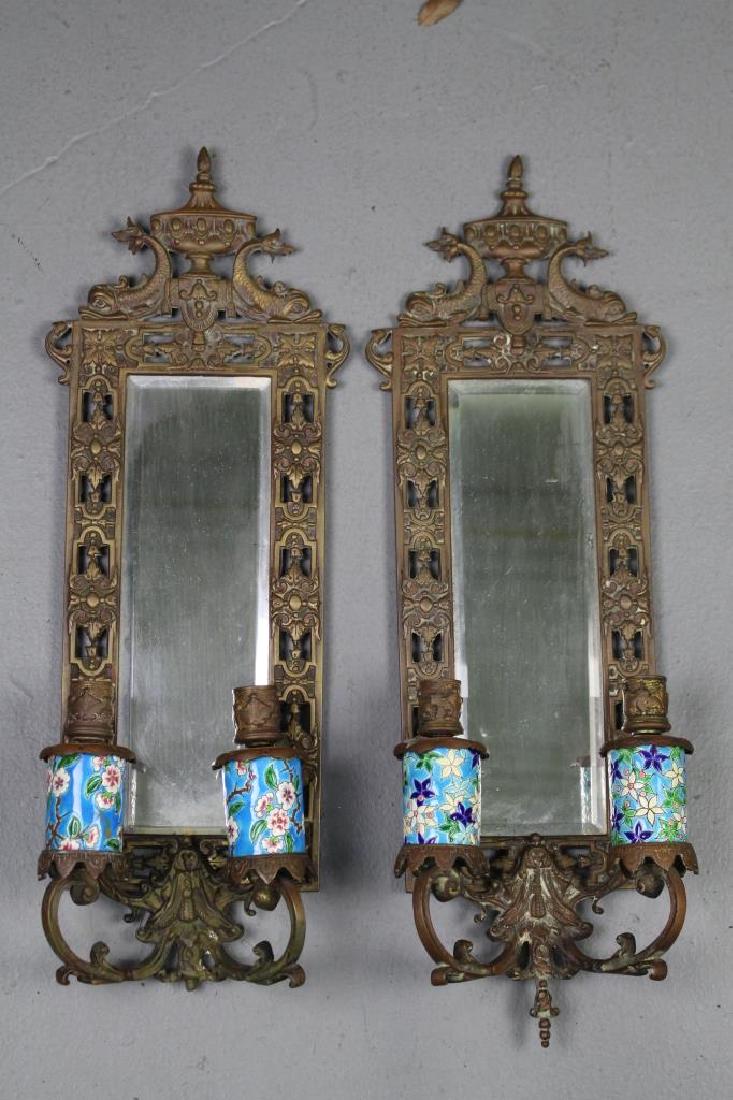 Pair Mirrored Bronze Dolphin Wall Sconces: with Longwy, France, porcelain holders, 23" x 8" x 4", bottom tip of one frame missing, otherwise good condition.