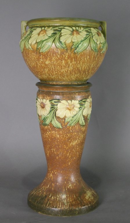 Roseville Pottery Jardiniere & Pedestal Dahlrose: #614-8, c. 1925, this is a smaller version of the form, 24" tall overall, brown textured background with bands of ivory stylized flowers and green leaves, good condition but jardiniere has small chip 