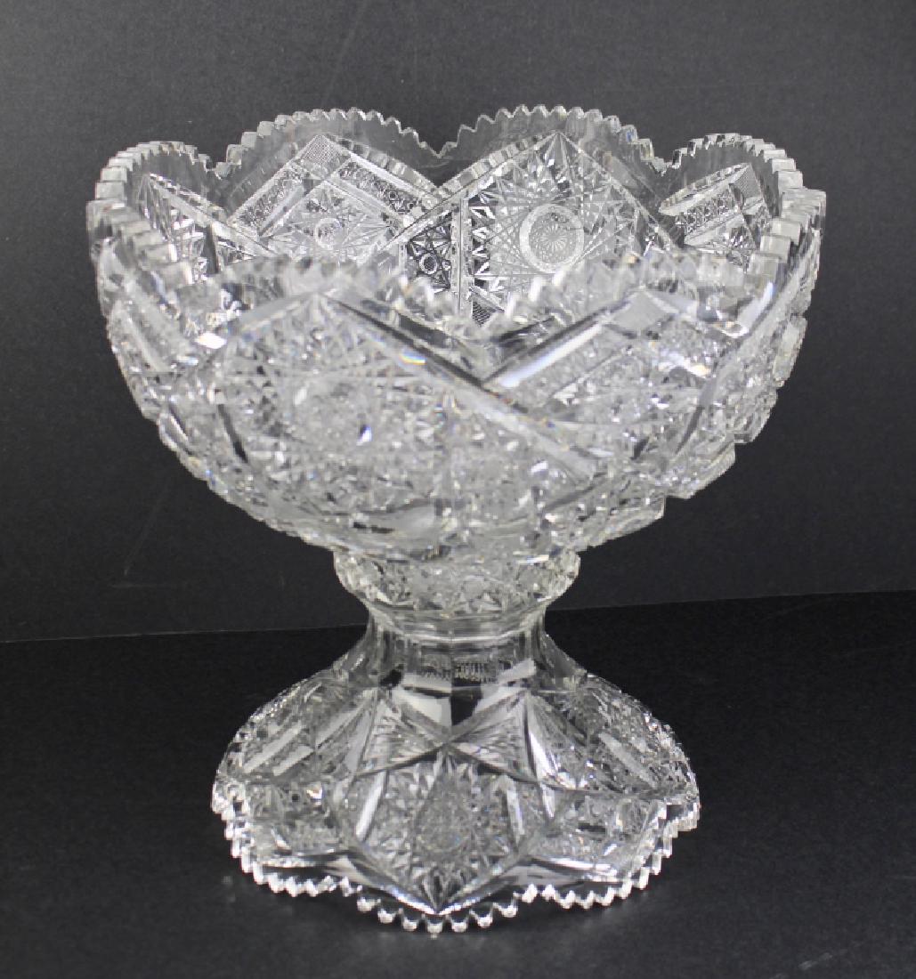 American Brilliant Period Cut Glass Punch Bowl: and pedestal, 14" massive bowl, 15" height, in exceptional condition. We attribute this piece to Libby from similar examples. A fine specimen.
