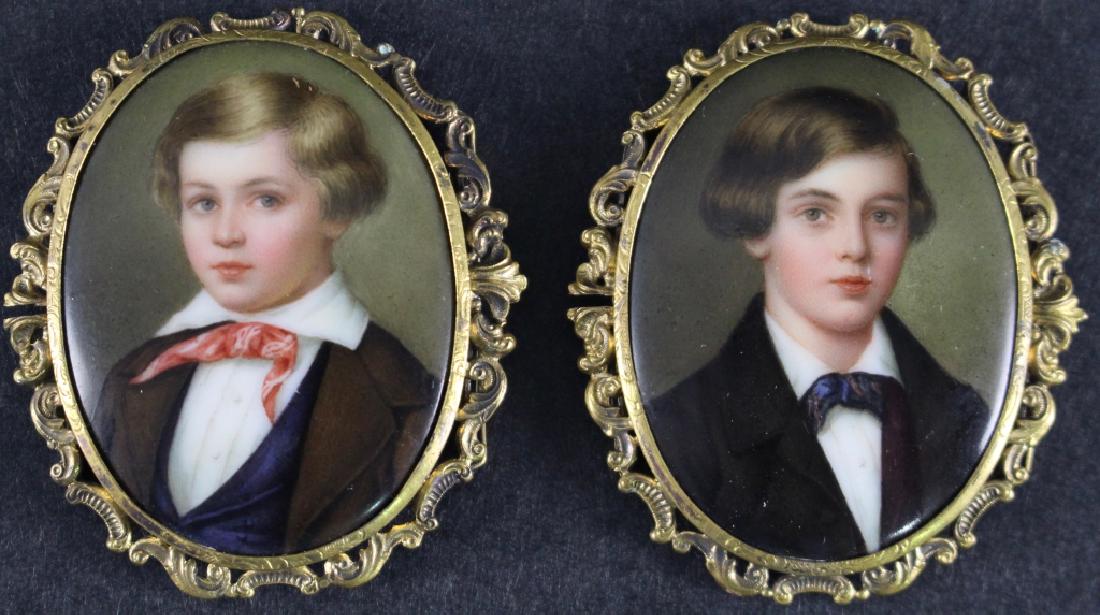 Two Miniature Portraits by Henry Bucker: each with young boy, painted on porcelain, signed and dated 1848, in gold filigree (untested) bezels, 2" x 1.75": Bucker was a painter on porcelain in Dresden and worked later at KPM, both good condit