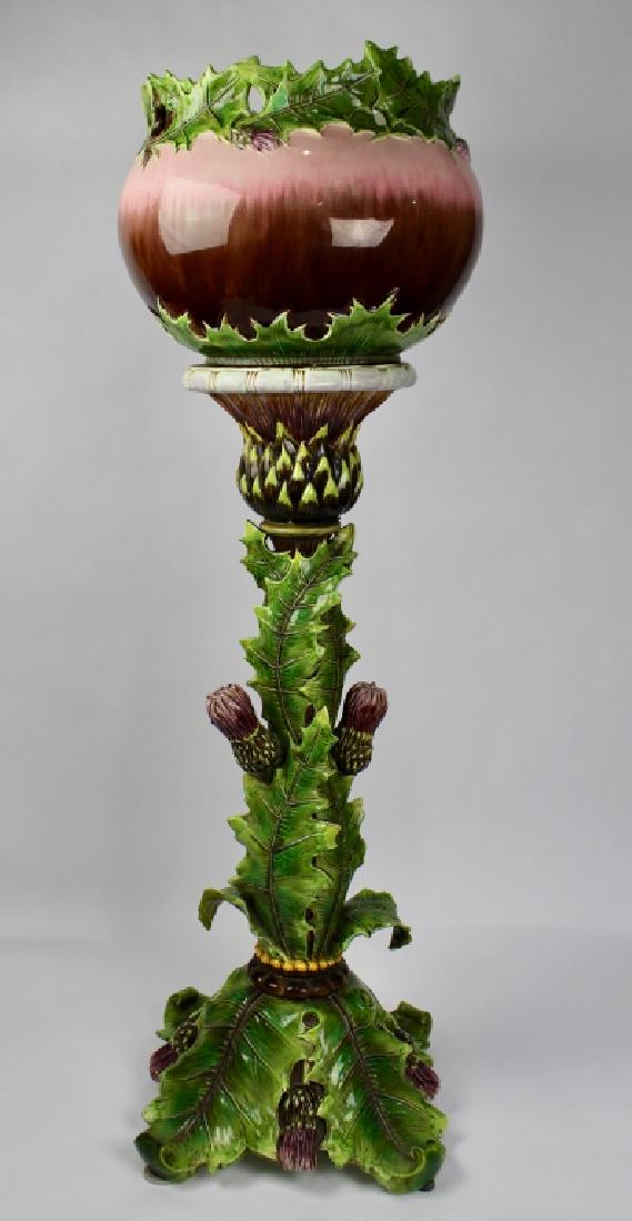 Julius Dressler, Austria Majolica Jar and Ped: Art Nouveau period c. 1900-05, both pieces signed. Thistle decoration in pinks, eggplant and greens, 48" overall height with 12" x 16" jardiniere, good condition considering age and fragility. 2.5" ha