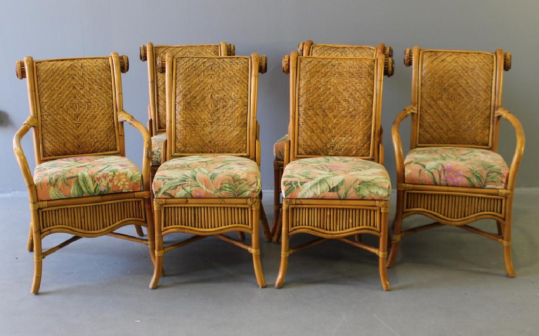 Set of 6 Rattan and Cane Dining Chairs: Indonesia c. 1975, tropical fabric upholstery, two arm chairs 39" x 24" x 26"d, seat 17" d x 18.5" w, four side chairs 39" h x 21"w x 26"d, all in good condition, sturdy.