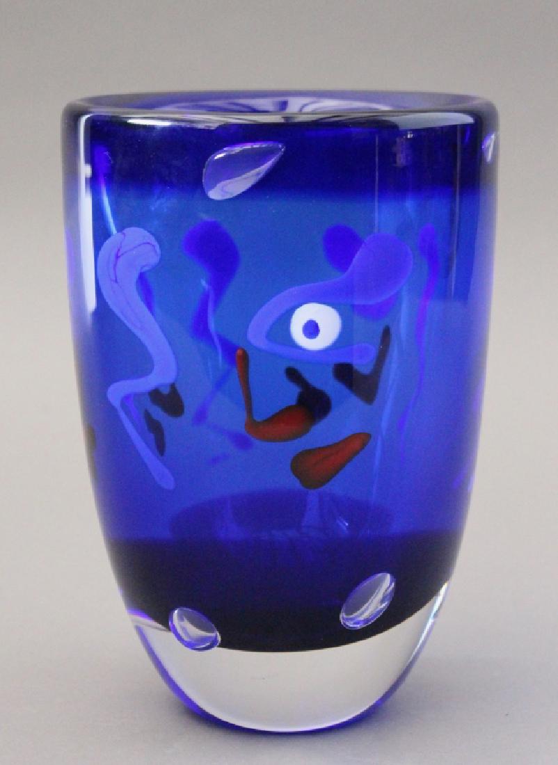 Carlos R. Pebaque, Swedish Art Glass Vase: Stromberg, 8.5" x 5.75" diameter, cased cobalt glass containing trapped air and colorful abstract designs, labeled on side, signed and dated, very good condition.