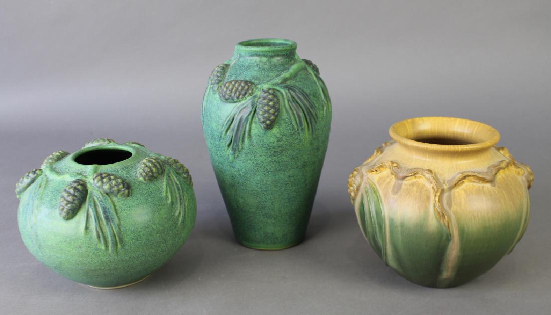 Three Contemporary Art Pottery Pieces: Door Pottery 6" x 7" vase with raised pinecone decoration by Scott Draves (signed), and two mat green pinecone decorated vases from an upstate New York studio, 9" x 5.5" respectively, all in good cond