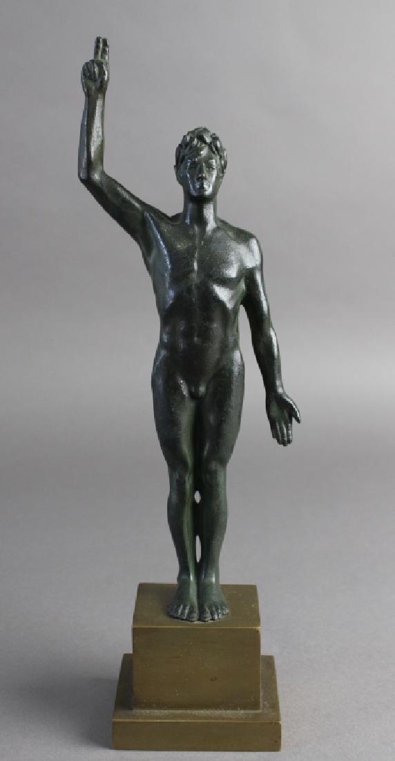 Pierre de Soete, 1886-1948, Bronze Sculpture: entitled "Le Sportif" or "Champion" black painted male on stacked polished bronze base, very good patina and condition, 13.75"h, signed on base.