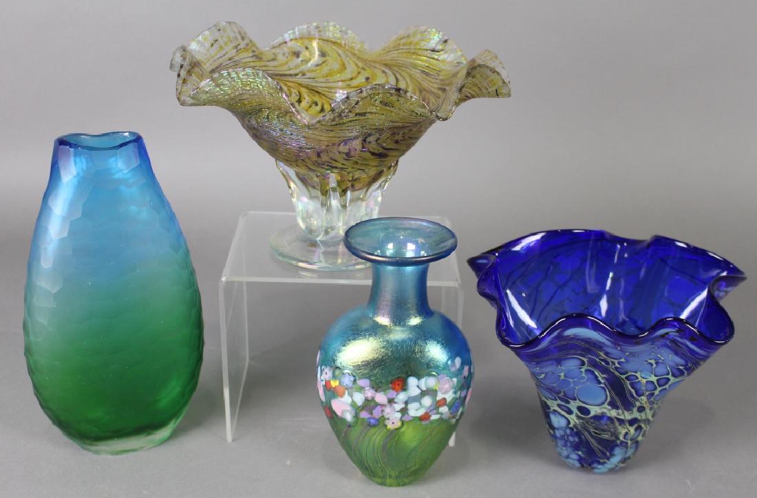 Four Pieces Studio Art Glass: Robert Heldd (foil label) 6.75" floral vase, a 5.5" x 9" Ron Mynatt footed iridescent "feathered" bowl dated 2011, a P. Benlover? signed cobalt and infused 5.5" x 7.5" bowl, and an unsigned faceted bl