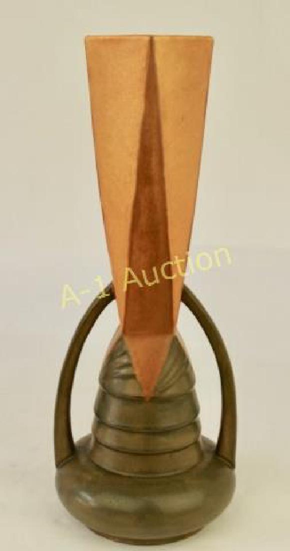 Roseville Futura Arches Vase: No. 411-14", 14.25" tall, brown squat base, tiered to angular top with two long handles, paper label, great condition.