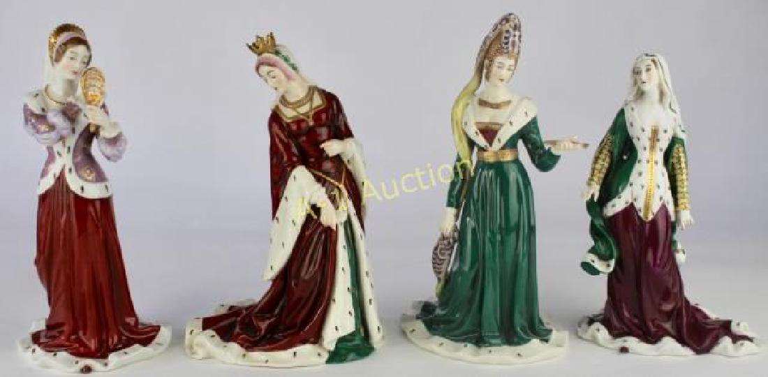 4 Porcelain Figurines-Queens of France: in the style of Sevres, each with blue ink stamp signature of a crown with "L" below it, each with impressed numbers, each 9.5" tall featuring "Isabeau de Baviere" wife of Charles VI, "Anne de Berlogn