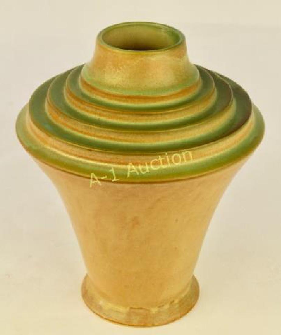 Roseville Futura 395-10 Vase: step urn vase, tan and green mat glaze, good condition. 10".