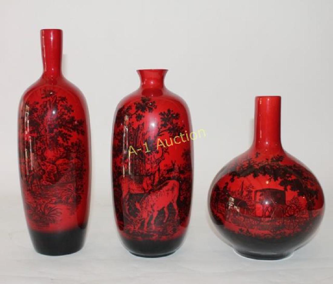 Three Royal Doulton Flambe Vases: from Flambe Woodcut series: 11" #1619, 13.75" #1617 and a 9.5" #1618, all in mint condition.