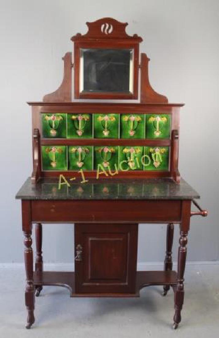 English Tile Back Wash Stand: with marble top and shaving mirror, dark hardwood base with 10 inset Art Nouveau tiles, black marble top, cabinet for thunder pot, towel bar, very good condition, 38" x 66" x 17".