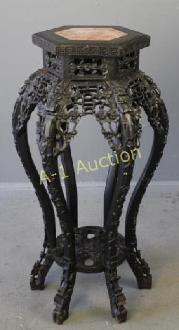 Asian Carved Hardwood Fern Stand: hexagon marble inset top, pronounced cabriole legs with intricately carved legs, apron and connecting stretcher base, 16" diameter, 32.5" tall, very good condition.