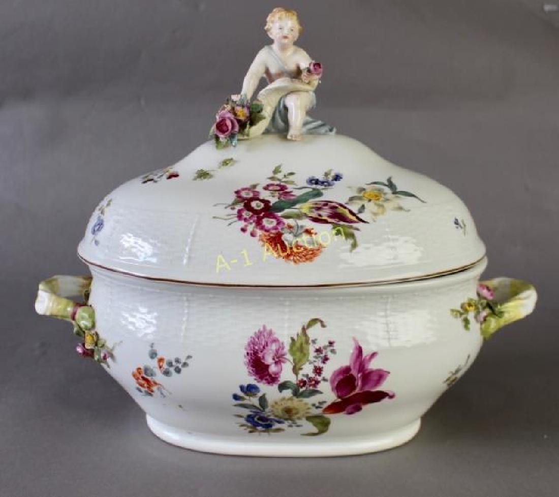 Early 19th Century Tureen: hand painted, probably Royal Porcelain Manufactory, Berlin, c. 1830, blue under glaze scepter mark, putti finial holding bouquet, two handles with applied florals, remarkably intact, secondary retaile
