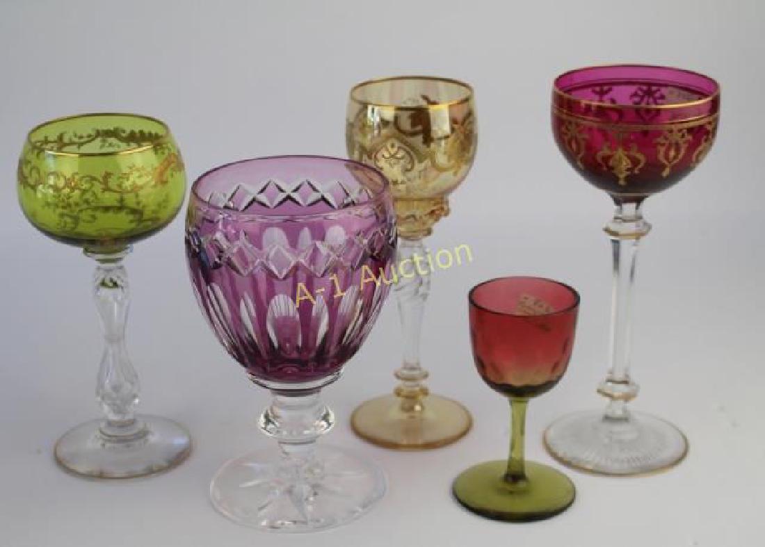 Five Elegant Stemware Pieces: amethyst faceted and cut goblet signed Steuben 6.25", 3 tall colored stems with gold enameling, and a Rubina Verde 4" wine, all in fine condition.