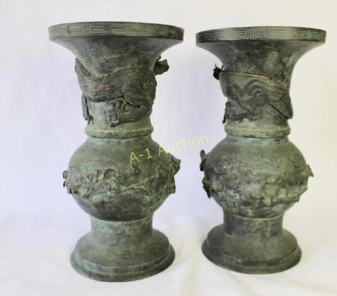 Pair Bronze Chinese Temple Vases: large and impressive 21" x 11.5" diameter, applied dragon around neck, Greek Key border around top rim, middle has raised Ming tree limbs and florals with birds, there is understated etching surroundi