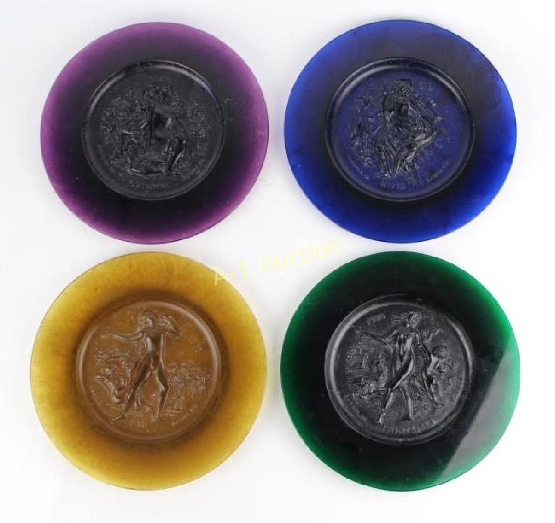 Daum Pate de Verre Glass Plates: in high relief, "The Four Seasons", dated 1970, 10.5" diameter, etched "Made in France", en verso along with the limited edition numbers of only 2000. Good condition.