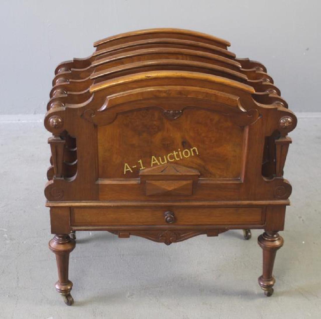 English Burled Walnut Canterbury: four divided sections, turned legs with original brass casters, single drawer below, 25" x 22.5" x 15", good condition and uncommon.