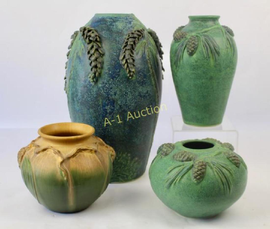 Four Modern Studio Art Pottery Vases: a 6" round Pine Cone vase in "Autumn Mix" brown glaze by Door Pottery, artist signed Scott Drave. Three Jemerick Art Pottery vases with pine cone decoration in green mat by Steven Frederick, 5.5" roun