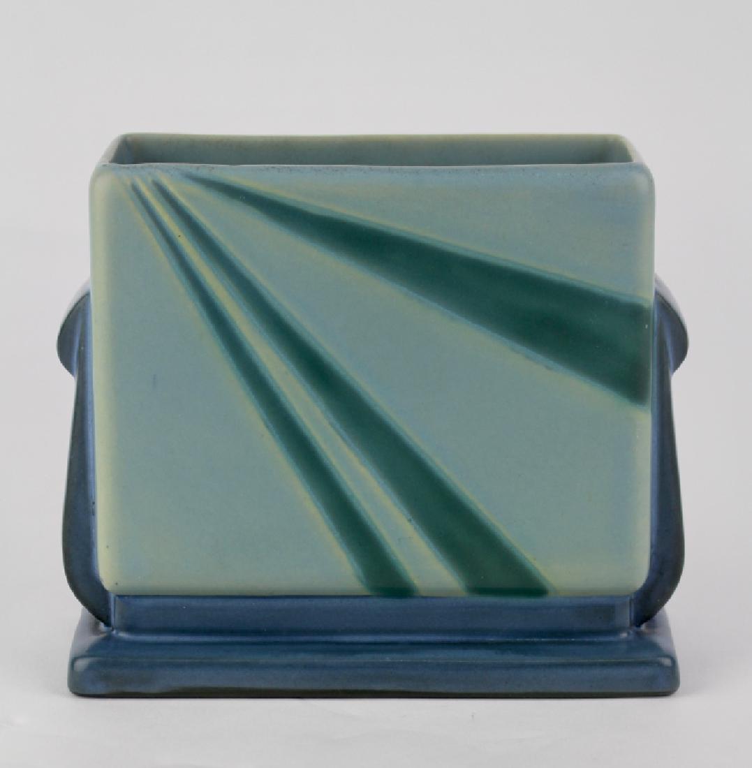 Roseville Futura Vase The Blue Sunray: #81, 5" x 1.5" x 5", black shield label. Fine condition.