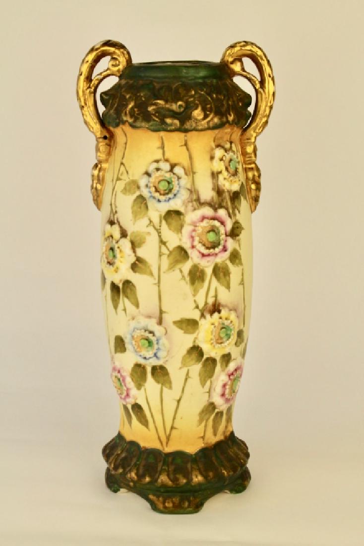 Amphora, Austria, Floral Vase: iridescent gold foot, matching top with two handles, blown out white roses with thorny stems, oval impressed marks, minor wear to gold on top of handles, 16".
