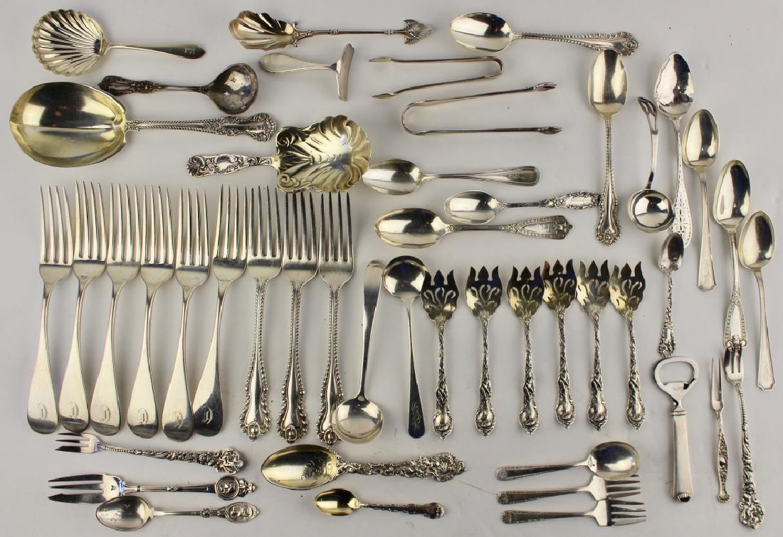 Gorham, Tiffany, Shreve, Sterling Group: Shreve, Crump & Low dinner forks, Reed & Barton "Mazarin" 3 forks, 6 Reed & Barton ice cream forks, Towle "Diane" nut scoop, Tiffany sugar tongs, Gorham Patricia large spoon, Kirk "Old English" sauce 