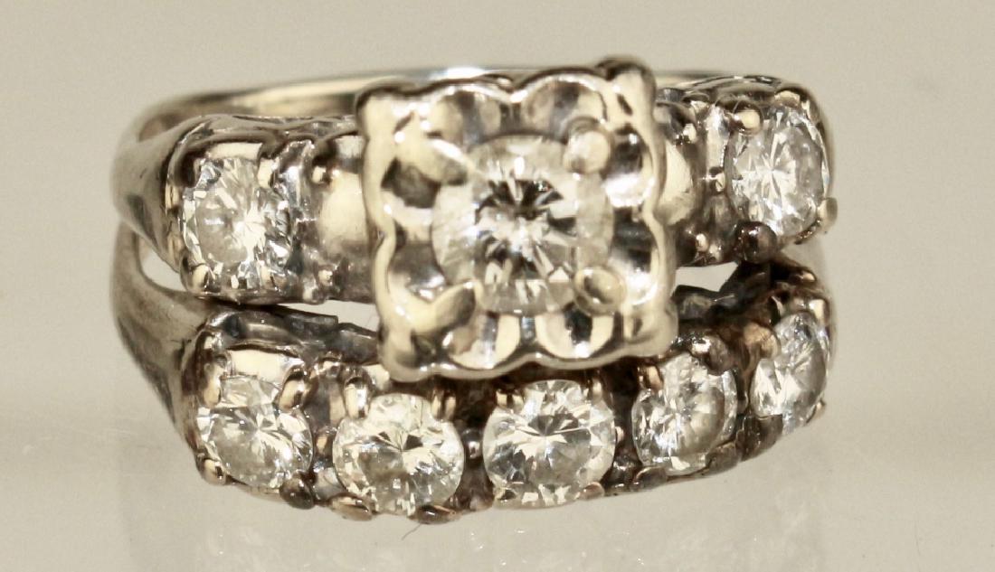 14K White Gold Diamond Wedding Set: center stone .25 in square setting 10 stones total, .75 twc. all J color and SI, ring size 4.
