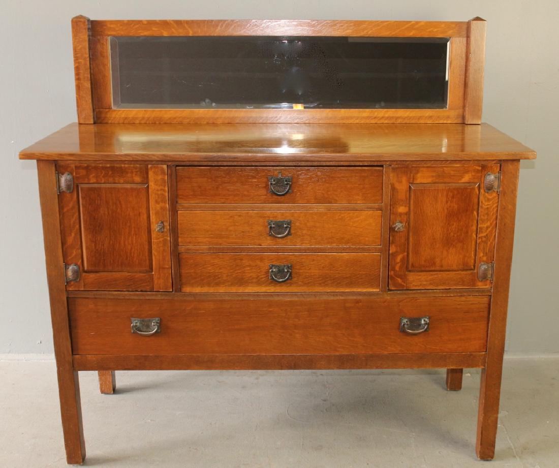 Stickley Brothers Arts and Crafts Sideboard: "Quaint", # 8838 with beveled mirror back plate (special order), this piece has a restored finish, all original hardware, 3 drawers over one long drawer, with 2 storage compartments, drawers slide smo
