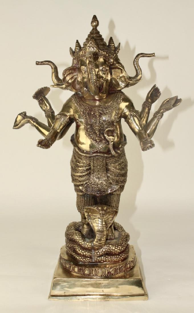 Sadbhuja Mahakala Sino-Tibetan Figure: Ganesha, multi-arm, 3-face elephant standing on stepped plinth with cobra wrapped around, 6-arms, polished bronze, 21" h x 14" w, very good detail, early 20th century.
