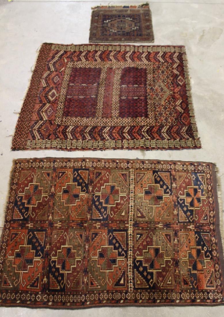 Group 3 Antique Oriental Textile and Mats: 44" x 52" Turkoman mat, a 36" x 55" Turkoman mat, both of these in really good condition for their age and a 24" x 21" Beluch saddlebag, in fair condition.