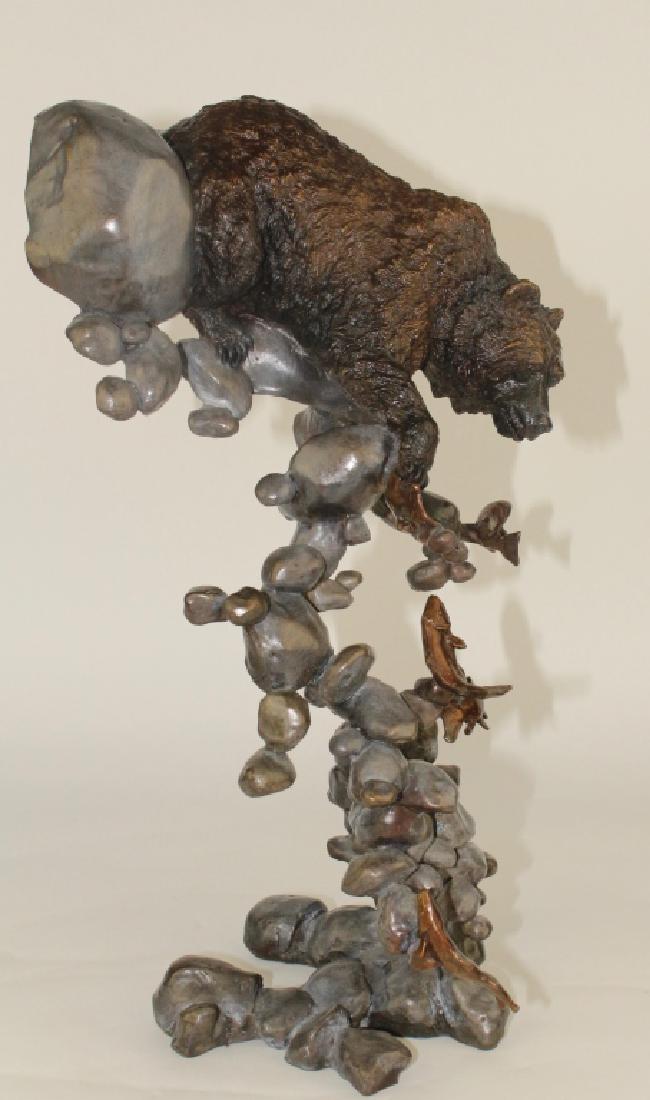 Mark Hopkins, Wildlife Bronze Sculpture: American 20th & 21st century, of Grizzly bear snagging salmon, Mr. Hopkins is especially known for his work suspended in air with negative space and balance, 18.5" x 10" w, signed great condition and 