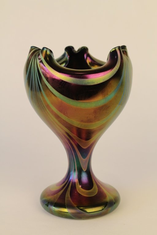 Rindskopf Bohemian Art Glass Vase: deep purple color with green iridescent swirls, loving cup shape with tri-corner pinched "M" shape rim indicative of Loetz, both companies made this shape but Rindskopf did with regularity, 8 x 5.5 di