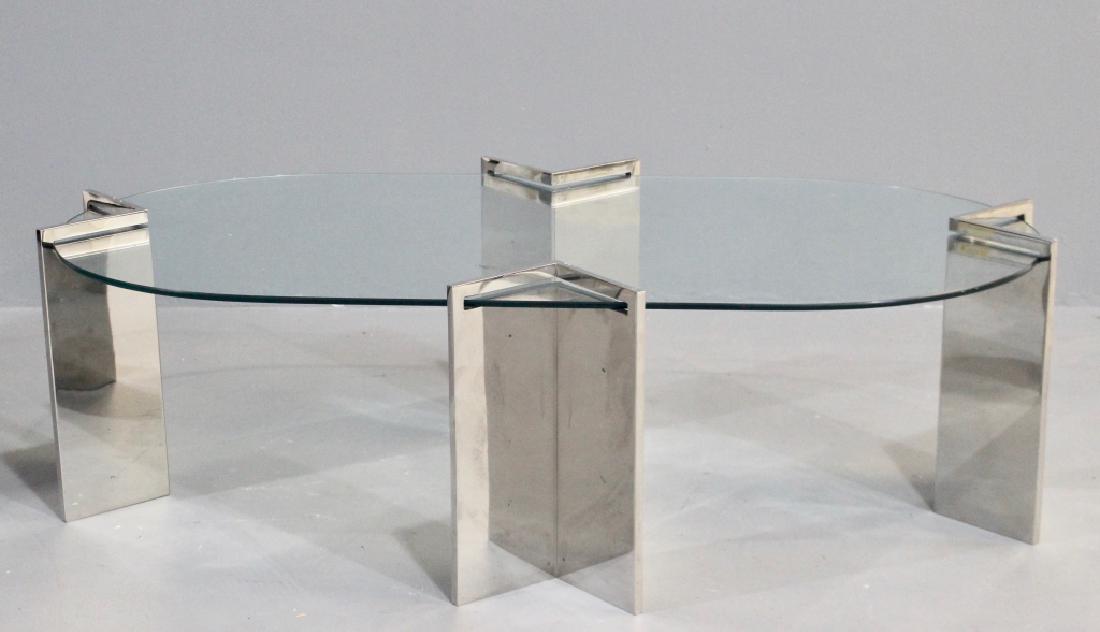 Leon Rosen for Pace Coffee Table: polished chrome legs with oval glass, 17" x 54" x 28", unsigned, very good condition.
