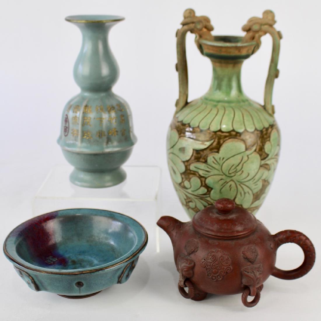 Group of Asian Ceramics: 4" x 7" Japanese terra cotta tea pot with four rings attached to applied faces, signed. 7" Chinese blue gourd shape lobed vase with gold incised calligraphy on body. 5.5" blue glazed finger bowl with 